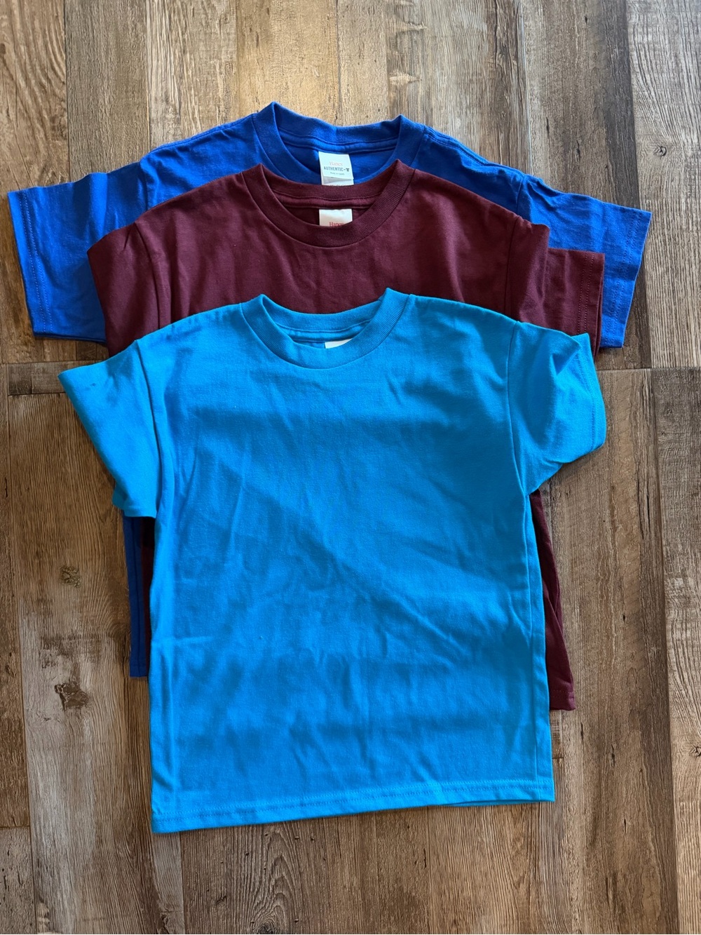 3 Hanes Kids Short-Sleeve Crewneck Tees - Bright Blue, Royal Blue & Maroon